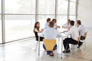 people using meeting room chairs