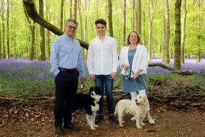 Alison Biggs occupational therapist with her family and two dogs